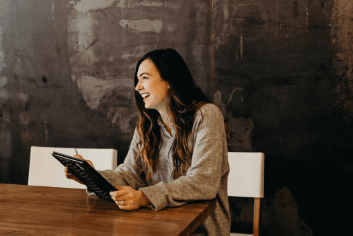 Recruiter reviewing work in a warmly lit room